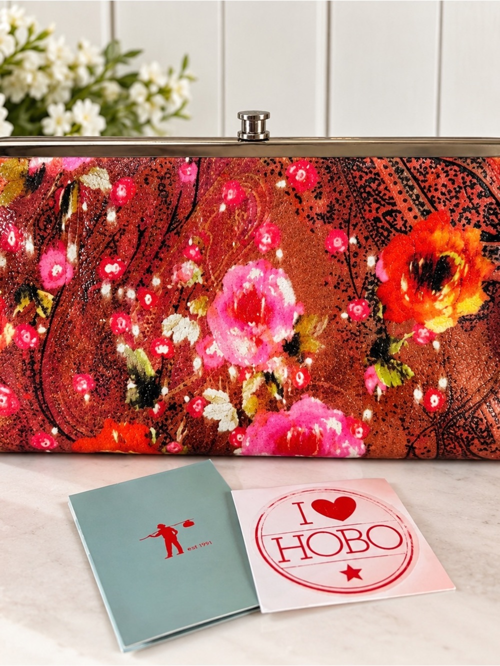 HOBO Floral Sequin Clutch in Pink and Orange